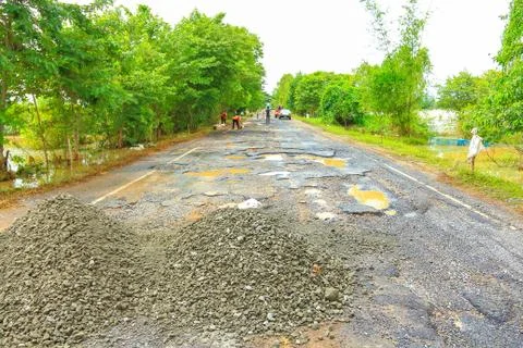 Road with potholes . Stock Photos