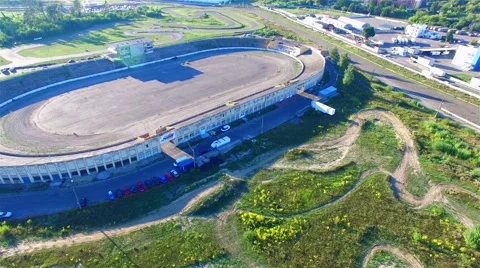 Road racing track stadium 4k aerial panoramic video. Sport building circuit race Stock Footage 67864560