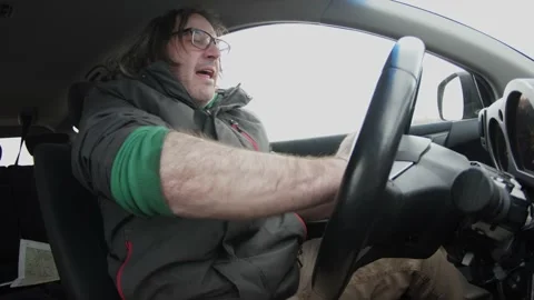 Road Rage Man Screaming and Honking Inside of His Car 스톡 동영상 150266222