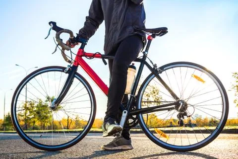 Road red bicycle Stock Photos