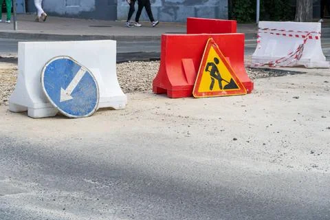 Road repair caution work in progress sign Stock Photos