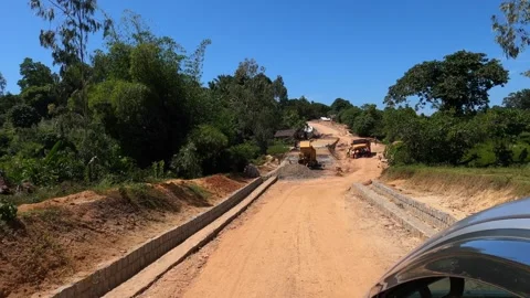 Road repairs on route 2 outside of Brickaville heading east coast of Madagascar Stock Footage 310063215