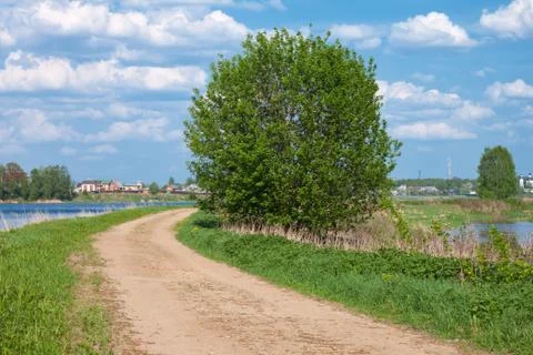 Road on a river coast Stock Photos