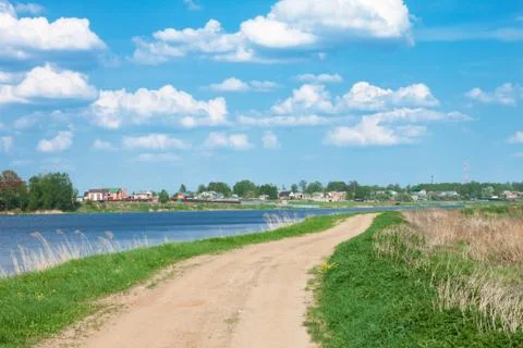 Road on a river coast Stock Photos