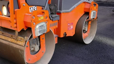 Road roller in action during asphalt repaving 스톡 동영상 253230880