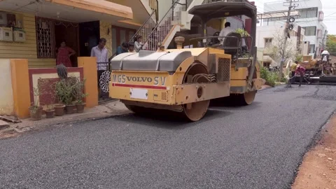 Road roller asphalting the road in Mysuru, India. Stock Footage 247421283