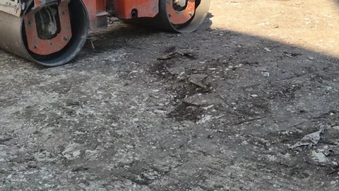 Road Roller Compacting and Leveling Ground at Construction Site Stock-Footage 334456204