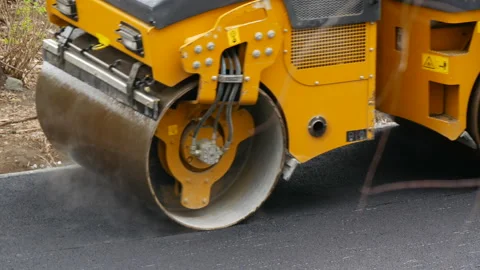 Road roller is compacting the asphalt. Stock Footage 335246837