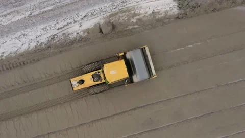 A road roller is driving on a construction site. Stock Footage 154202484