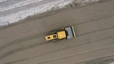 A road roller is driving on a construction site. Stock Footage 154562639