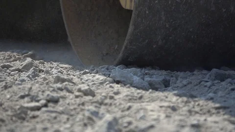 Road roller kneads the ground, road construction, 250 fps HD, slomo Stock Footage 107200480