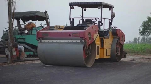 Road Roller on the road Stock Footage 250450452