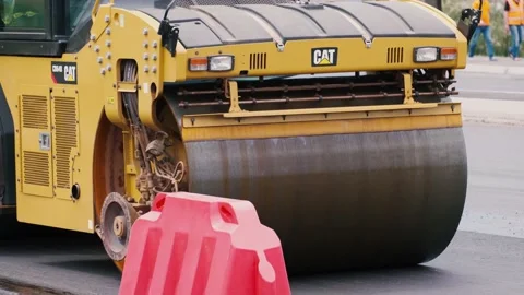 Road rollers working on a city street. Heavy industrial machinery Stock Footage 132523634