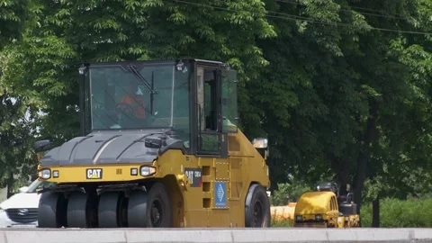 Road rollers working on city street. industrial machinery on road construction Video stock 133107735