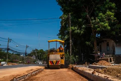 Road rollers working on the new roads construction site. Heavy duty machinery Stock Photos