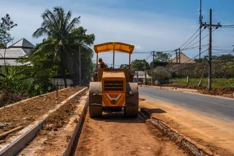 Road rollers working on the new roads construction site. Heavy duty machinery Stock Photos