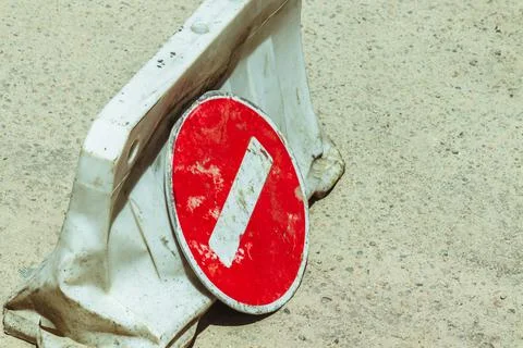The road is an round sign that indicates that entry and movement is prohibited. Stock Photos
