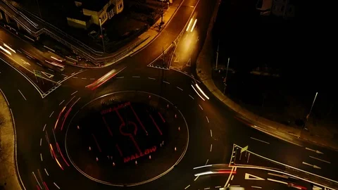 Road roundabout at night panning timelapse Stock Footage 83097918