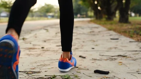 Road runner couple running in park. Stock Footage 103376836