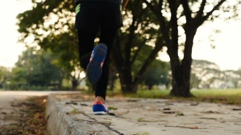 Road runner couple running in park. Stock Footage 103377285
