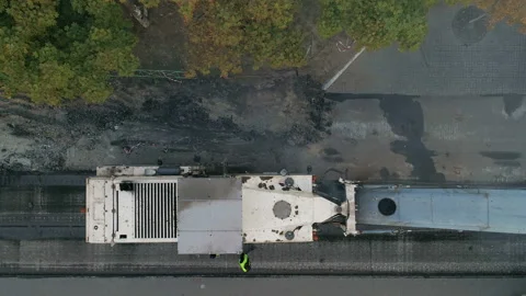 Road Scraping Machine Removes Old Asphalt During Construction Stock-Footage 95319170