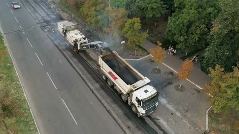 Road Scraping Machine Removes Old Asphalt During Construction, 4K Stock-Footage 95319726
