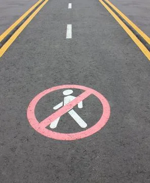 Road section with road markings regulating the movement of pedestrians. No .. Stock Photos