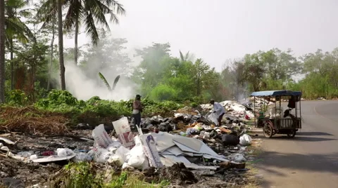 Road side garbage dump people sorting Thailand Video stock 61734796