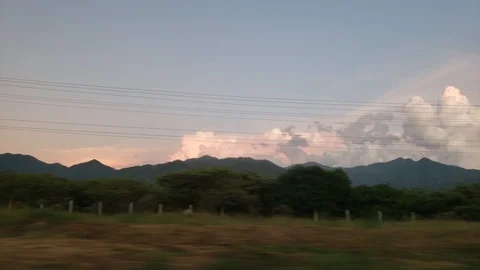 Road side view of mountains during sunset. Stock Footage 103954050