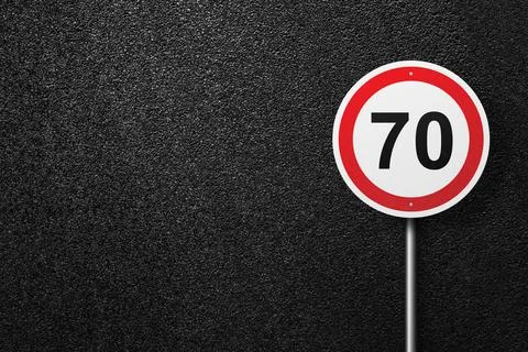 Road sign on a background of asphalt. Stock Photos
