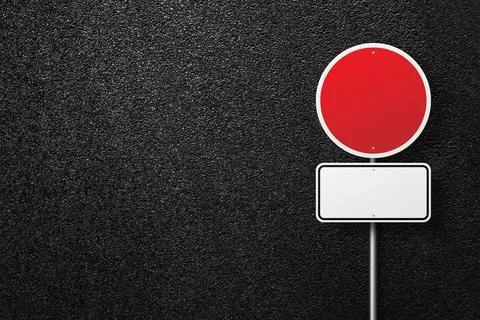 Road sign on a background of asphalt. Stock Photos