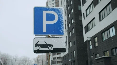 Road sign blue color of the pointer of the parking lot. Allowed parking place Stock Footage 119915691