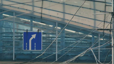 Road sign for car drivers on the background of the city. Road traffic sign Stock Footage 141573232