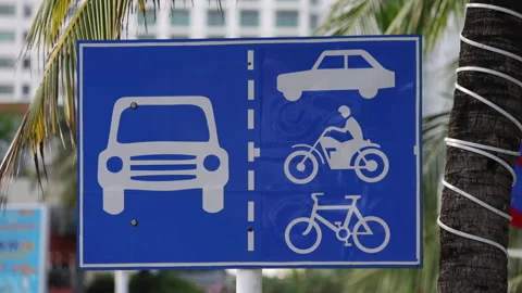 Road sign directing traffic for different vehicles Stock Footage 336563480