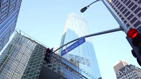 Road sign Francisco St in Down Town with office buildings Stock Footage 256382162