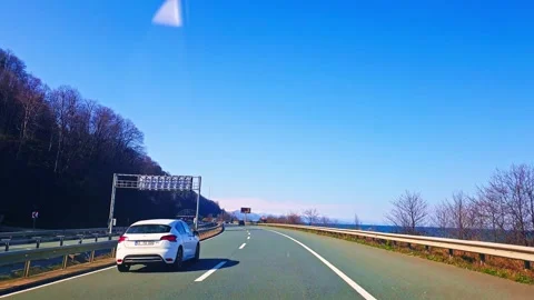 A road with a sign on it Stock Footage 273013489