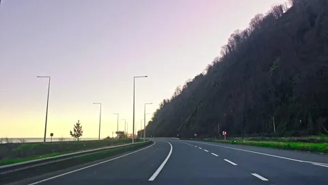 A road with a sign on it Stock Footage 273014914