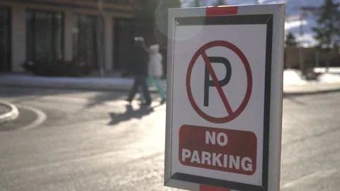 Road sign NO PARKING. Red sign prohibiting parking Stock Footage 298876953