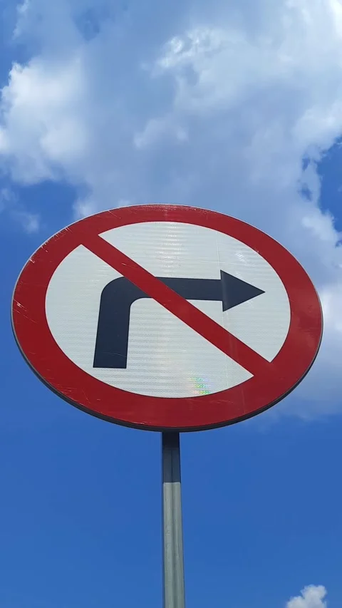 Road sign No right turn on blue sky with clouds background. Stock Footage 263359366