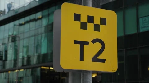 A road sign on a pole in the city, on the backdrop of a modern glass building. Stock Footage 311151765