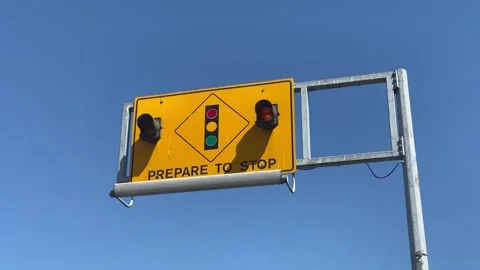 Road Sign of PREPARE TO STOP WHEN Lights are FLASHING Stock Footage 280879392