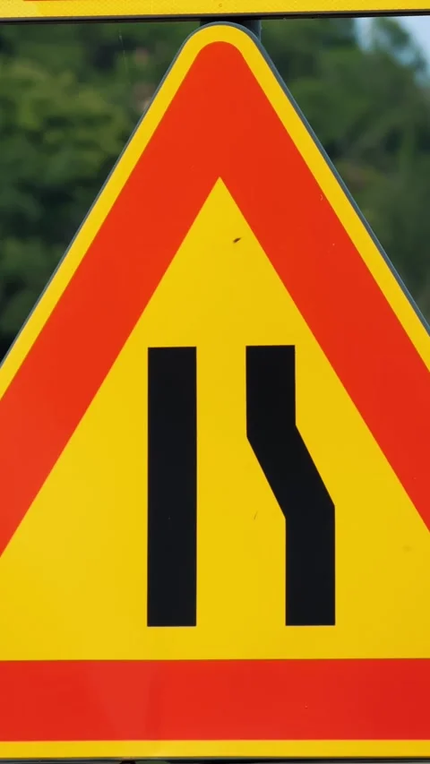Road sign. triangle. Road narrows. detour of repair work. close-up. Repair work Stock Footage 313231614
