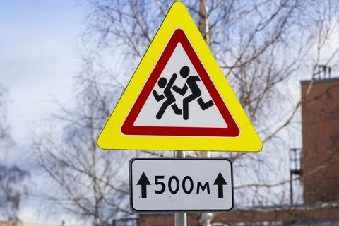 Road sign triangular shaped cautiously children 스톡 사진
