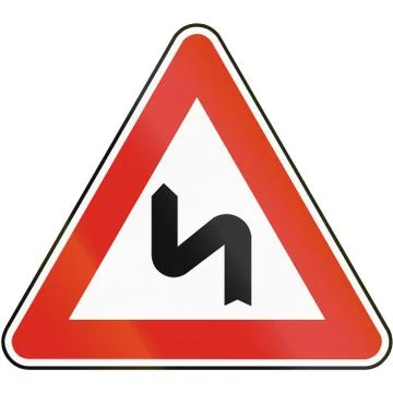 Road sign used in Slovakia - Double bend, first to the left Stock Illustration