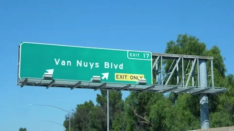 Road sign for Van Nuys Blvd. Driving in Los Angeles, USA. Stock Footage 261586445