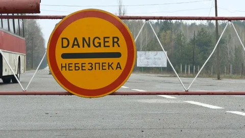 A road sign warning about danger. Barrier danger blocks the road Stock Footage 74932574