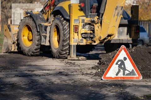 Road sign warning about work on the road Stock Photos