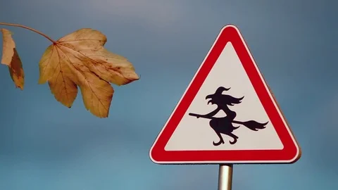 Road Sign of Witch in Hat Flying on the Broom Stock Footage 80340452