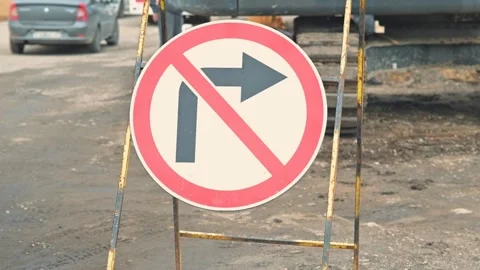Road signs are displayed in a construction area, showing restrictions against Stockbeeldmateriaal 344675816