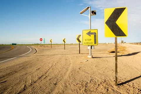 Road Signs of Sharp Left Turn 스톡 사진